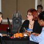 Conference attendees enjoy some wine and cheese during the President’s Wine & Cheese Halloween Reception