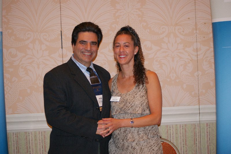 DSC04957.JPG - FMDA president Dr. John Symeonides (left) with Stacey Harner of Silvercare Solutions.